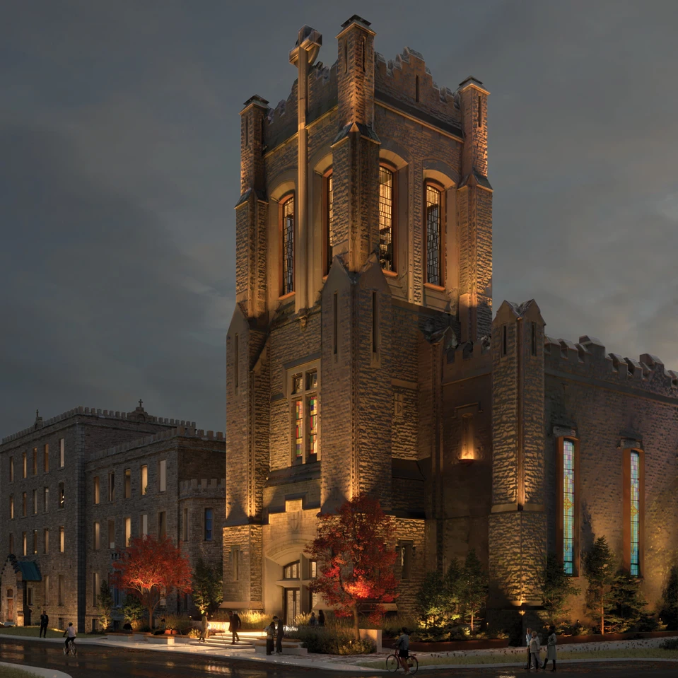 Vue extérieure de l’église de l’École secondaire catholique Saint-Jean-Baptiste à Ottawa, éclairée en soirée, illustrant sa transformation envisagée en espace événementiel et culturel pour la communauté francophone.